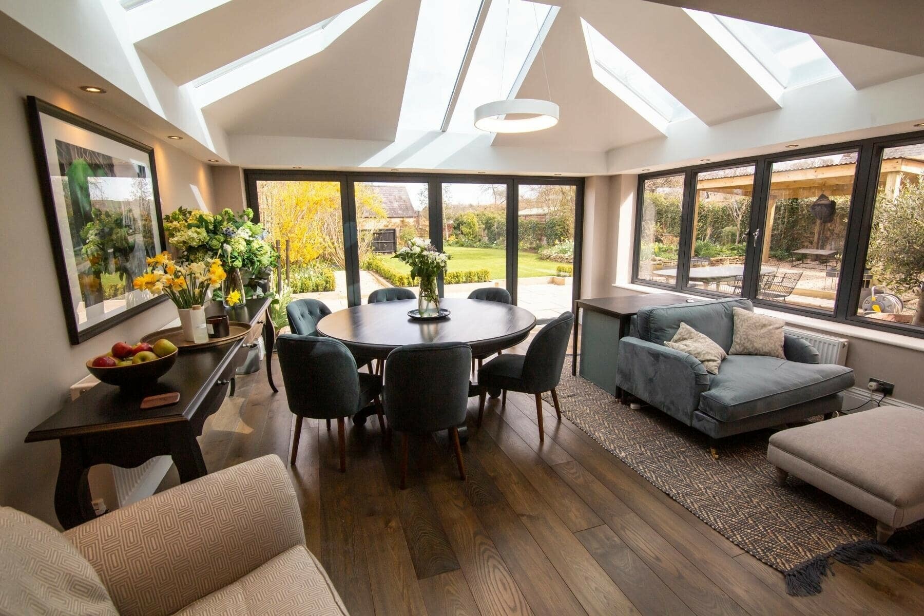 Livin Roof interior with feature skylights over a dining area