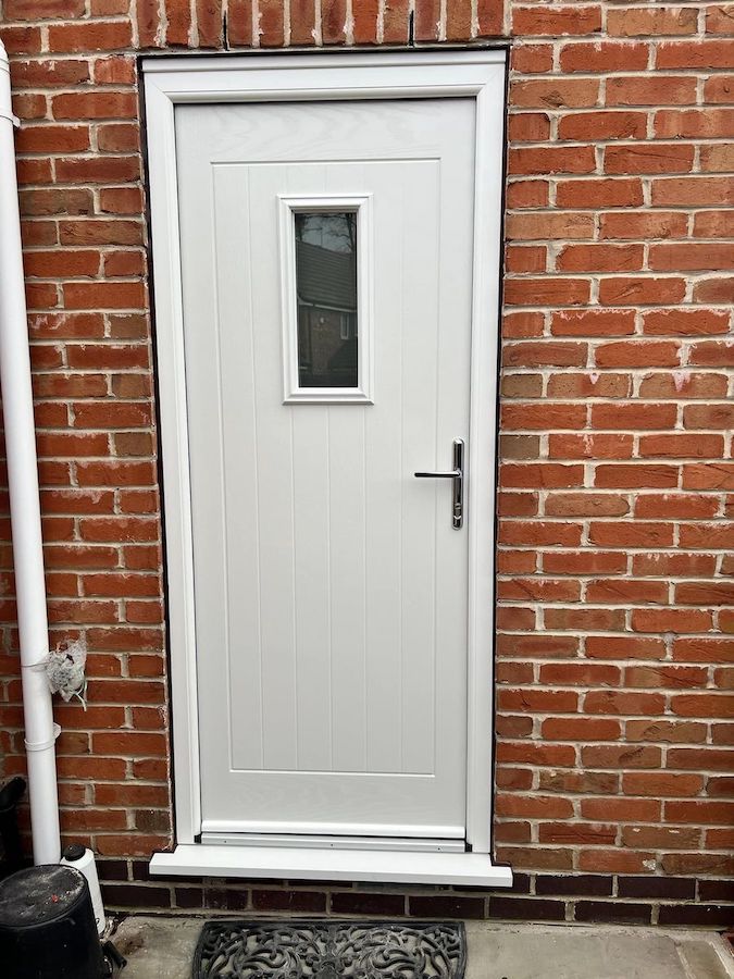 White uPVC door on an Island home